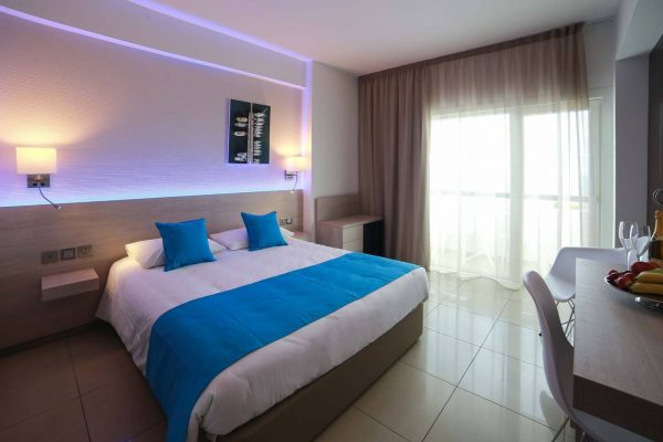 A modern boutique hotel room with big double bed